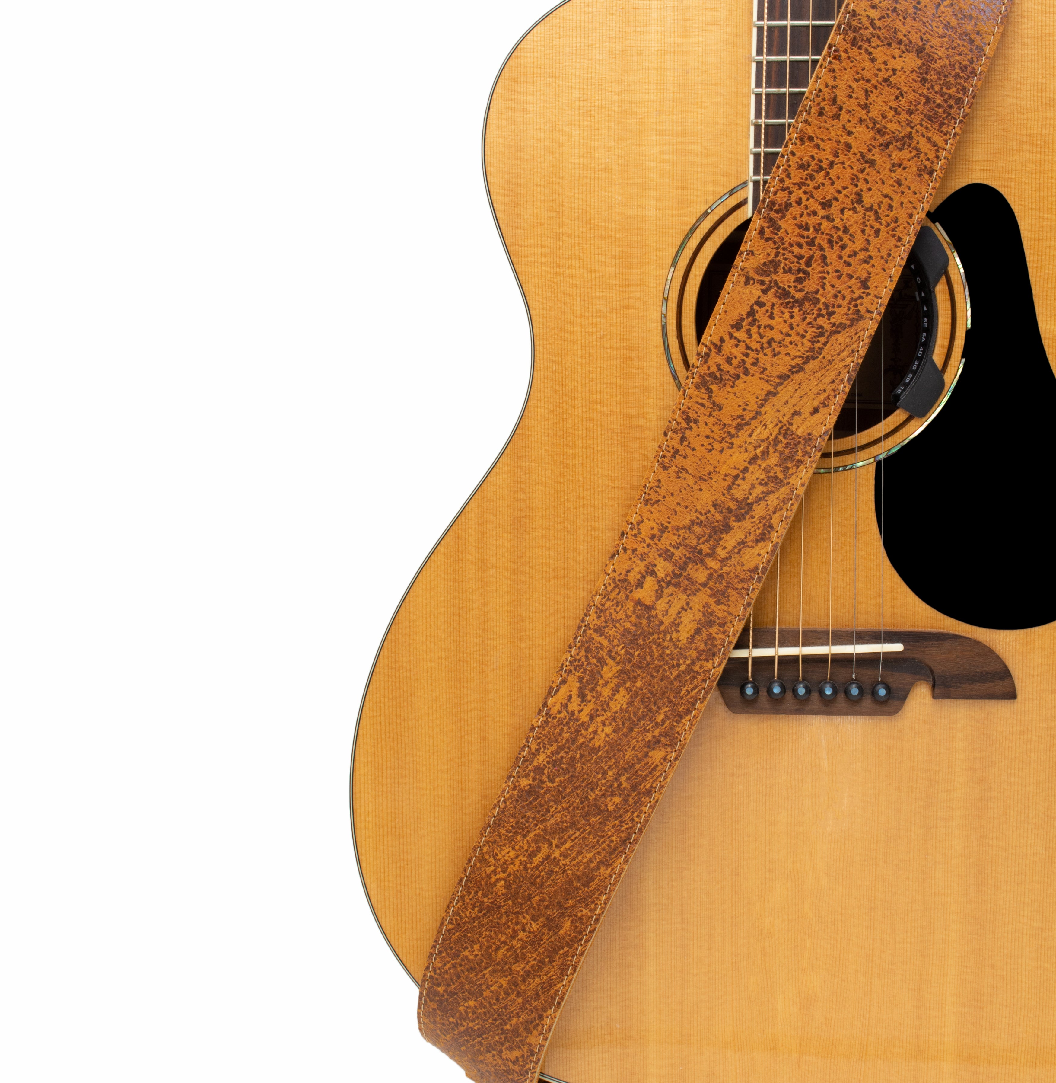 Sangle de guitare finition usée par la route