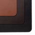 Three leather samples in brown, black, and a reddish-brown color on a white background.